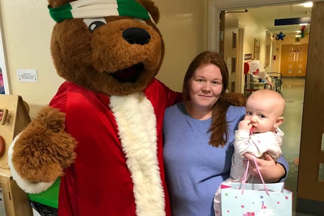 Bognor Regis Town footballers delivered Christmas presents to children on Howard Ward at St Richard's Hospital in Chichester