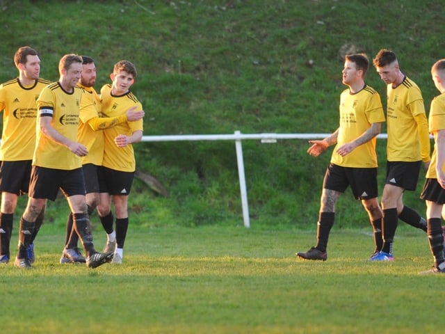 Littlehampton Town players celebrate the opening goal