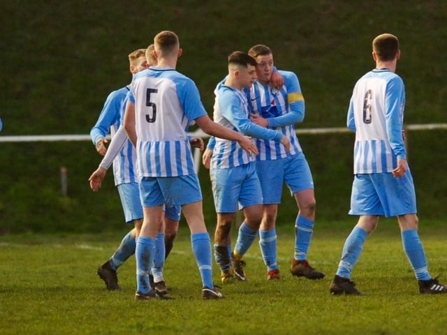 Worthing United celebrate the equaliser