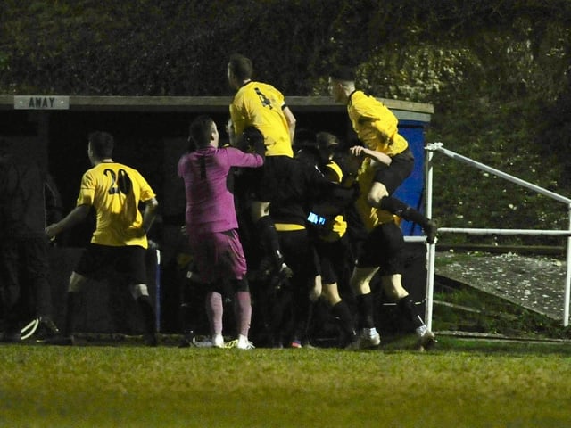 Littlehampton Town players celebrate the winner