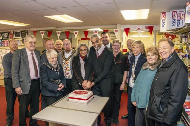 Mac and Naina Patel cut the cake at their silver anniversary celebration on Monday with Post Office staff and customers, as well as mayor of Bognor Phill Woodall, Pam Mosley and chairman of Aldwick Parish Council Lilian Richardson
