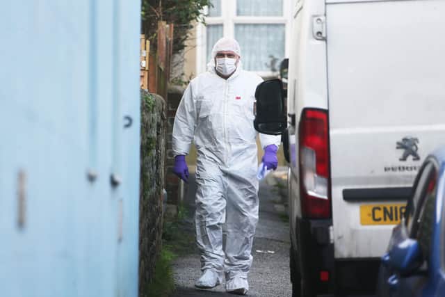 A forensics officer at the scene in Newhaven