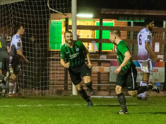 Pat Harding reels away in celebration after netting the winning goal. Picture by Chris Neal