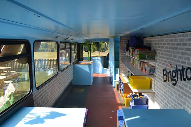 The inside of the play bus on its opening day
