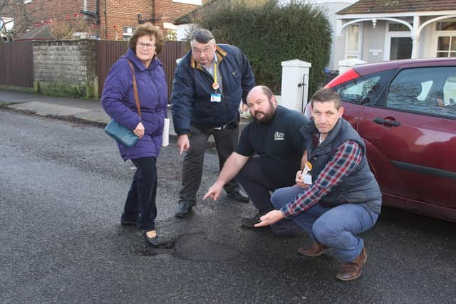 DM2010157a.jpg. Potholes in Tarring Road, Worthing. From left, Cllr Hazel Thorpe, Cllr Bob Smytherman, resident Colin Wigham and Cllr Martin McCabe. Photo by Derek Martin Photography SUS-200701-134907008