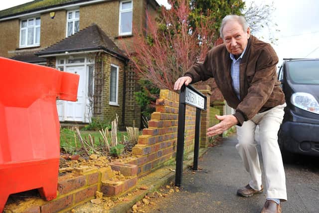 Ron Harris, Lewes Road, Lindfield, is frustrated that his wall which has been knocked down six times by traffic due to the fact that street lights are being switched off at night.