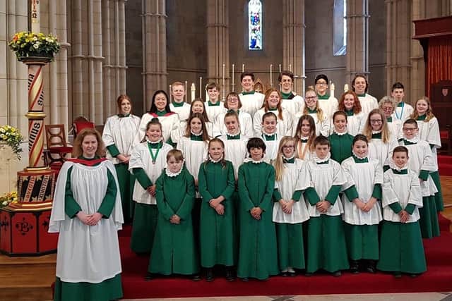 Elizabeth Stratford, organist and master of the choristers, with the Arundel Cathedral choir. Picture: Christopher Gaskell