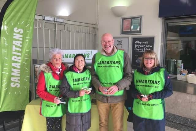 Worthing Samaritans volunteers handing out free tea at Worthing railway station for last year's Brew Monday