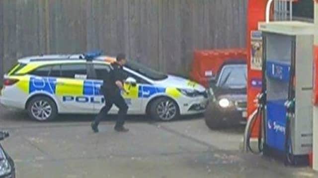 A police car was rammed at a Copthorne garage  SUS-200115-162543001
