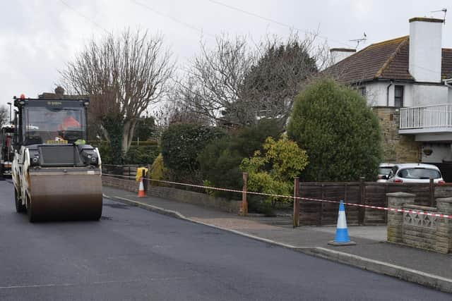 JPOS West Sussex County Council press release photo of a road being resurfaced to prevent potholes