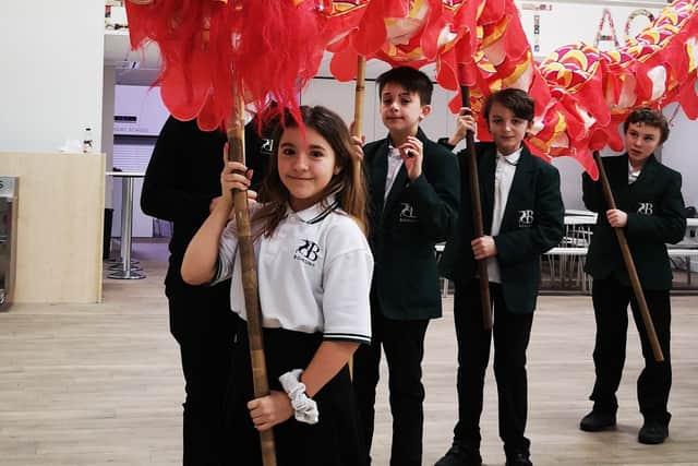 Year seven students with the Chinese dragon
