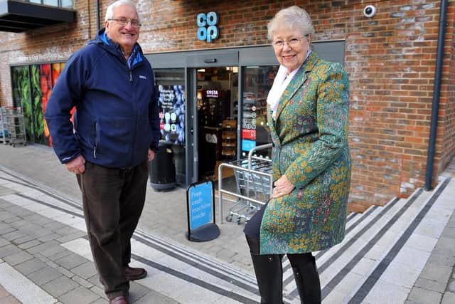 County councillors Andrew Barrett-Miles and Anne Jones outside the new Co-op store in Burgess Hill. Picture: Steve Robards