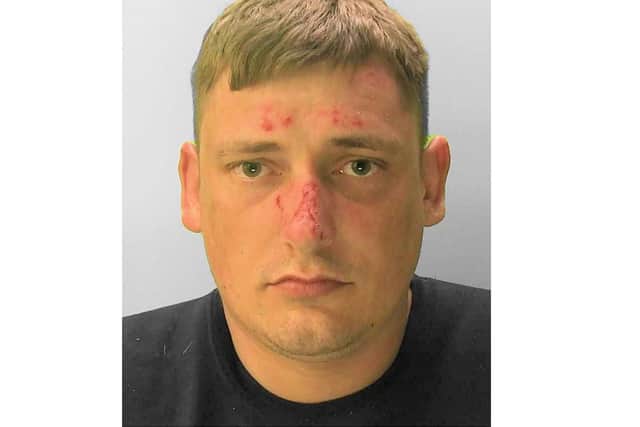 Robert Cox is wanted for recall to prison. Picture: Sussex Police