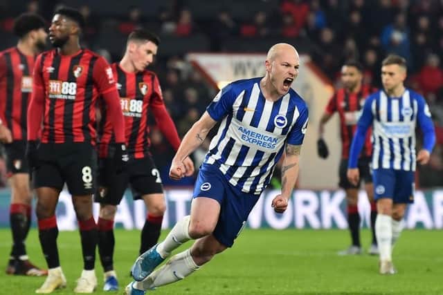 Aaron Mooy makes it 3-1 and celebrates what proved to be a consolation goal for Albion