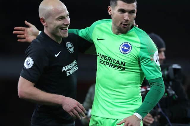 Aaron Mooy with his Albion teammate and fellow Socceroo Maty Ryan