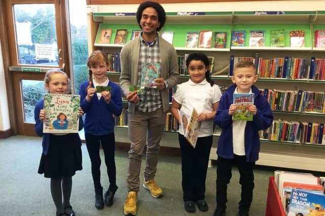 Performance poet Joseph Coelho with pupils from Steyning CE Primary School