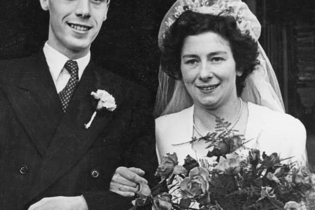 Gerald and Pam Etherton from Warnham on their wedding day in 1950 SUS-200127-155335001