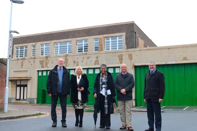 The Stagecoach depot in Bedford Row, Worthing, has been revamped.  councillor Jim Deen, Sue Belton, Worthing Society chairman, Jordan Trimby, planning enforcement officer, councillor Kevin Jenkins, the council's executive member for regeneration, and Edward Hodgson, managing director of Stagecoach.