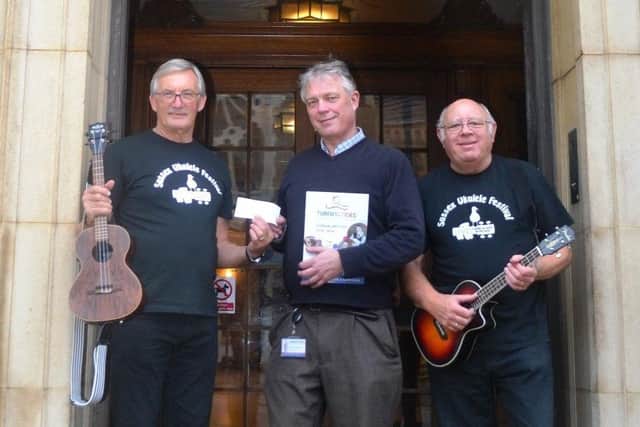 From left, Sundown Ukulele Band leader Peter Clark, Turning Tides chief executive John Holmstrom and Quayside Ukes leader Derek Parr at Worthing Town Hall, where Turning Tides is based