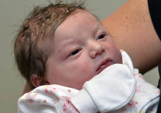 A baby born at Eastbourne DGH Midwifery Unit (Photo by Jon Rigby)