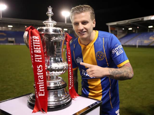 Jason Cummings of Shrewsbury Town poses with the FA Cup (Photo by Catherine Ivill/Getty Images)