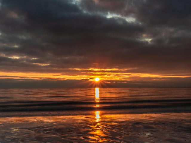Sunset at Birling Gap, by Marcus Berrisford SUS-200129-111525001