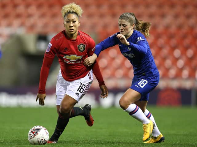 Lauren James of Manchester United and Maren Mjelde of Chelsea FC on the ball during the FA Women's Continental League Cup Semi-Final  (Photo by Charlotte Tattersall/Getty Images)