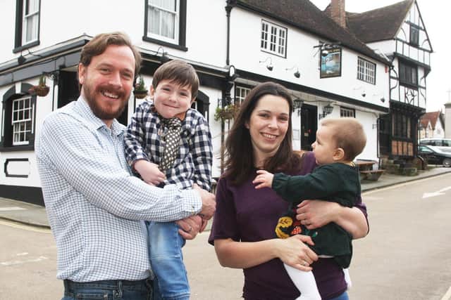 DM202780a.jpg. The Swan Inn, Red Lion St, Midhurst, has changed hands. Digby and Katie Furneaux and Barnaby 3 and Lottie 7 months. Photo by Derek Martin Photography SUS-200302-175750008