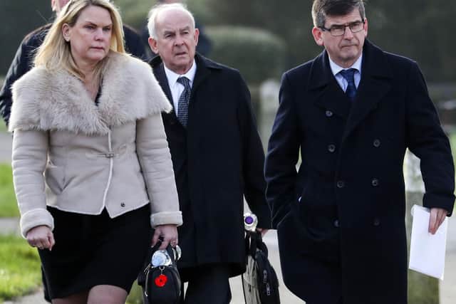 Brenda Elmer's husband Alec Elmer (centre) and her son Jonathan Elmer (right) arrive at West Sussex Coroners Court in Crawley for the inquest. Photo: Steve Parsons/PA Wire