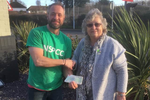 Sam Cocozza from North Star Pines presents the cheque to Rosemary Hannam, secretary of the NSPCC South and Mid Sussex Branch