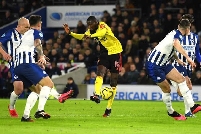 Watford's Adrian Mariappa fires home the opening goal in the 1-1 draw against Brighton