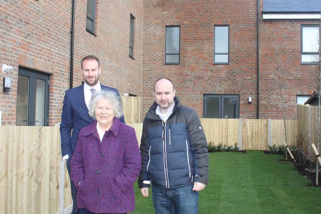 Head of housing and community Rob Jarvis with Councillor Kate Rowbottom and Councillor Chris Brown at the new flats