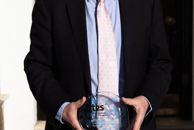 Richard Foster, headmaster at Windlesham House School, with his TES Award SUS-201202-093604001