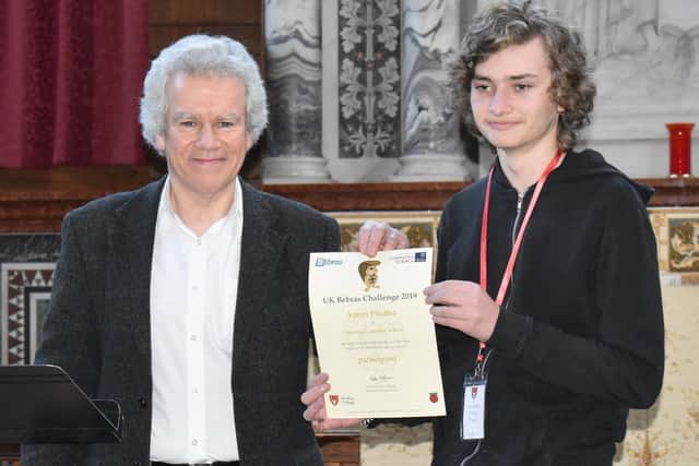 Aaron Poulter receives his certificate from Peter Millican, professor of philosophy at Hertford College, Oxford