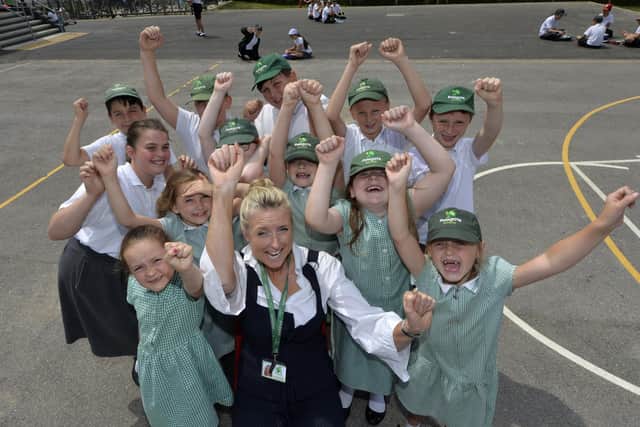 Headteacher Claire Martin-O'Donoghue and pupils at Polegate School. Picture: Jon Rigby