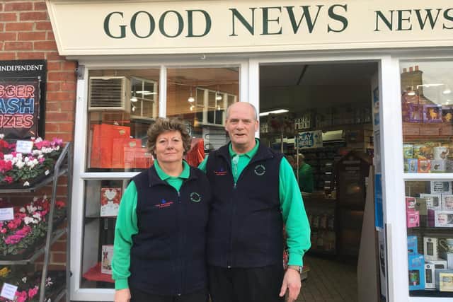Joyce and Mike Tidy outside their shop in St Martin's Street