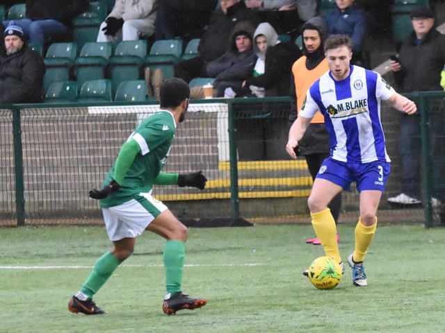 Tom Summerfield takes on a defender
