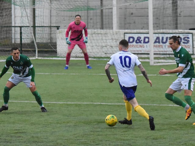 Ryan Warwick takes on the Ashford defence