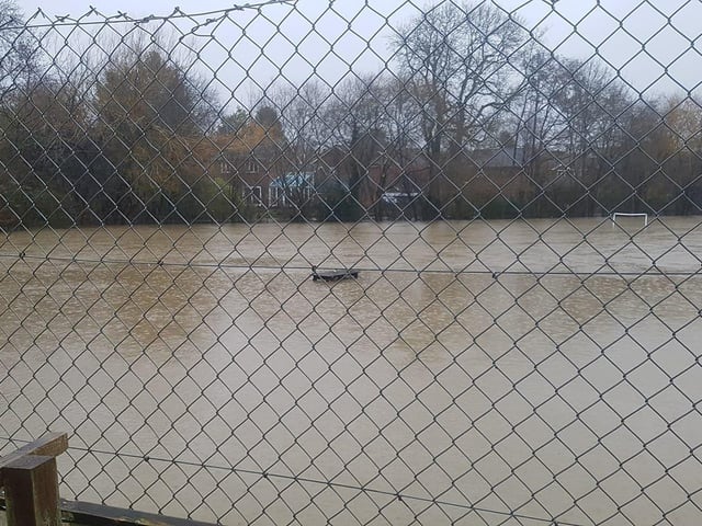 The playground of Arunside Primary School in Blackbridge Lane, Horsham, was submerged SUS-200216-143535001