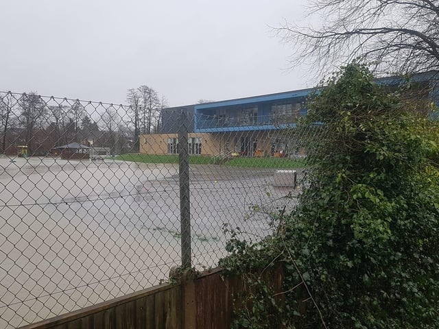 The playground of Arunside Primary School in Blackbridge Lane, Horsham, was submerged SUS-200216-143525001