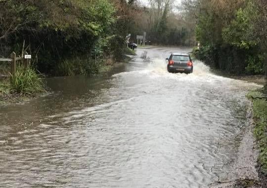 Storrington Road in Thakeham was more like a river SUS-200216-162845001