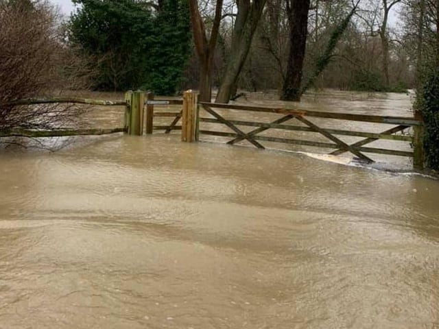 Old Wickhurst Lane was flooded halfway up the gateposts in Horsham SUS-200216-162814001