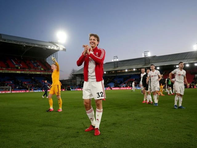 Strong and athletic on the right of midfield. Tackled well and kept his passing crisp and simple. Solid.