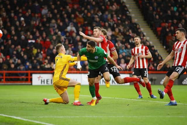 Neal Maupay's instinctive header flies into the net at Sheffield United