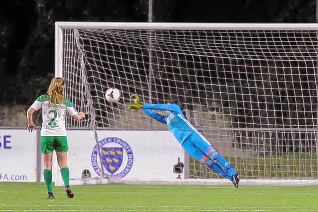 Goalkeeper Frankie Gibbs crucially saves Sharna Capel-Watson's kick in the shoot-out. Picture by Dave Burt