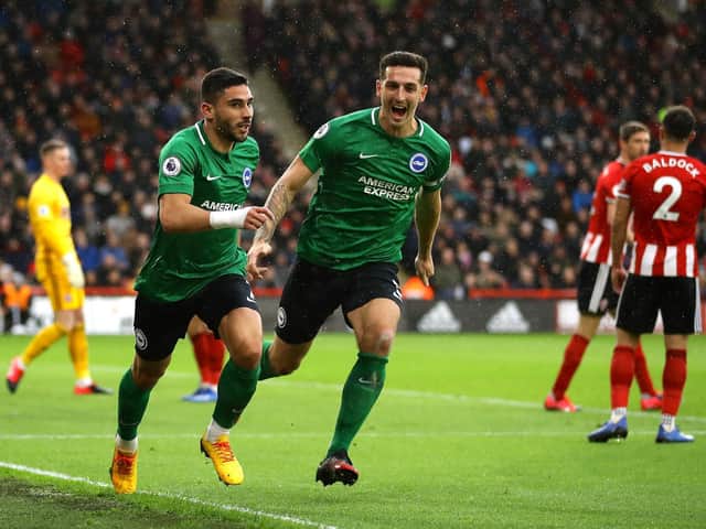 Neal Maupay and Lewis Dunk celebrate at Bramall Lane last Saturday