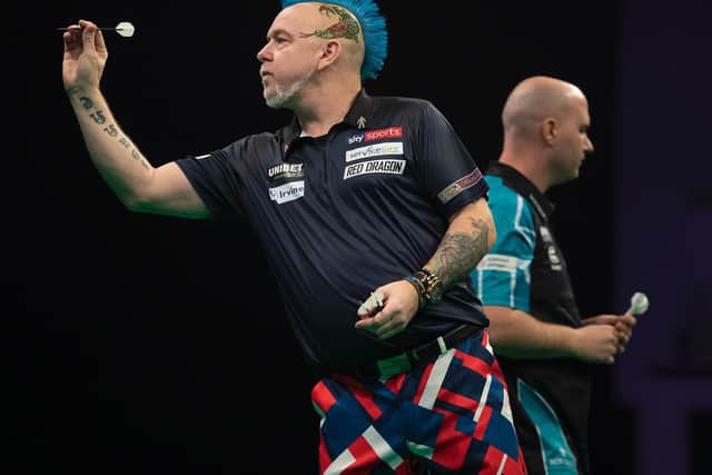 The reigning PDC World Darts Champion Peter Wright averaged 101.95 in his victory. Picture courtesy of Lawrence Lustig/PDC