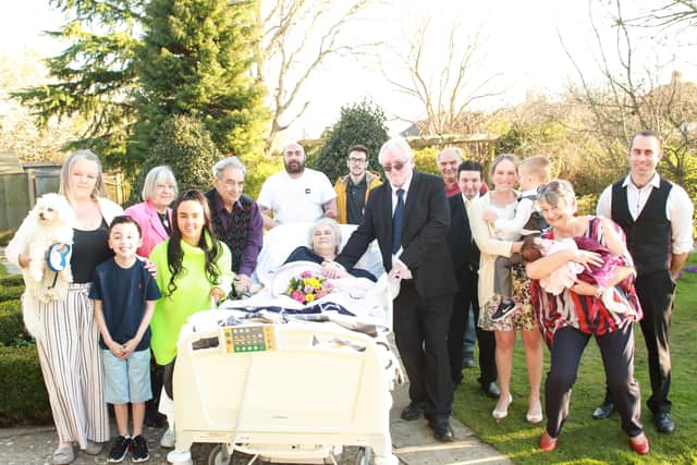 Sally and John Paice with their family at their vows renewal ceremony in 2018 in the garden of St Wilfrid's Hospice's former site in Grosvenor Road
