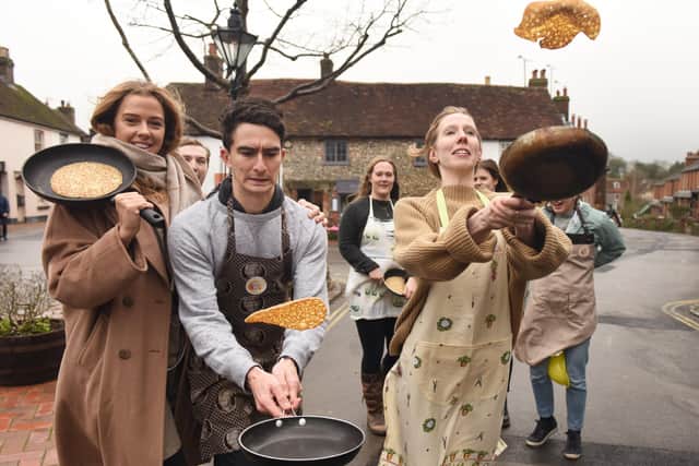 Participants at the first Great Alfriston Pancake Race. Photograph: Justin Lycett/ SUS-200223-142054001