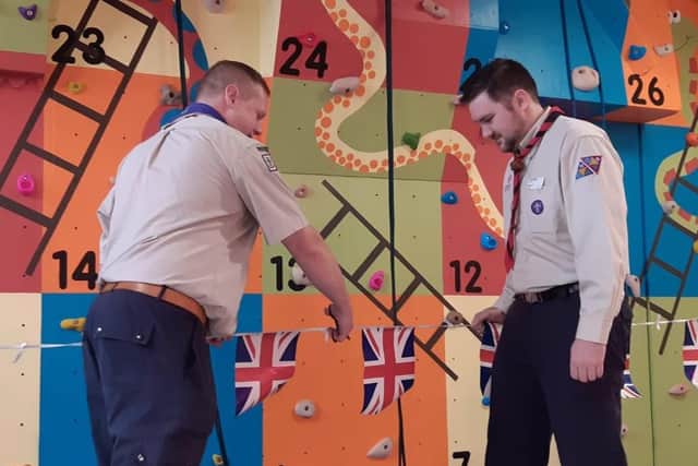 West Sussex Scouts' county climbing adviser James Wright and district commissioner Cameron Baldock officially open the climbing wall